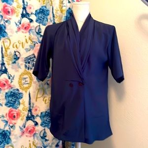 Navy blouse. Like new! Size small. Buttons in front!